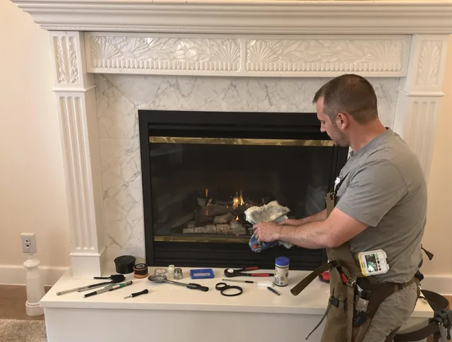 Ansonia Chimney Sweep performing fireplace maintenance in Ansonia, CT